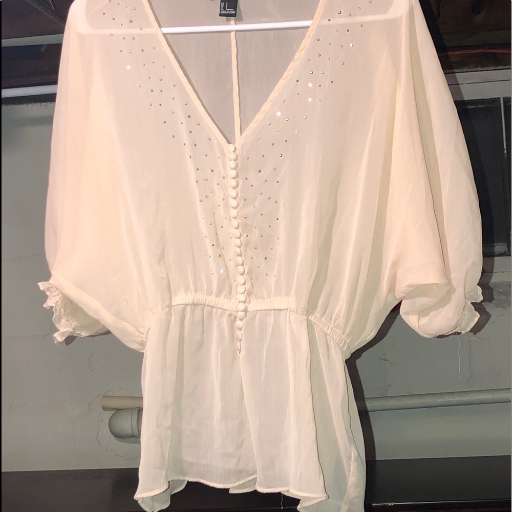 Sheer top with rhinestone